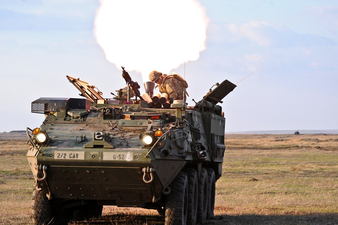 U.S. soldiers fire a mortar system from a Stryker combat vehicle during a live-fire exercise in Romania, April 8, 2015.