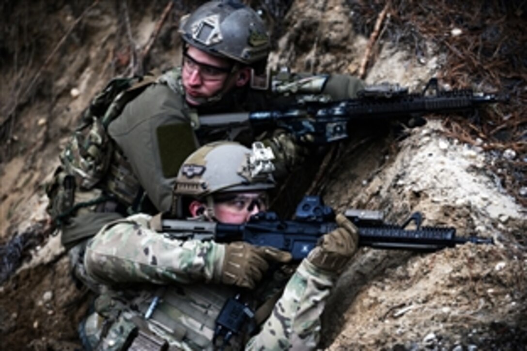 New York Air National Guard members conduct a multiday, live-fire course at the firing range in Westhampton Beach, N.Y., April 9, 2015. The training included tactical movement, responding to incoming fire, retrieving and caring for wounded individuals, and night shooting. The soldiers are assigned to the 103rd Rescue Squadron, 106th Rescue Wing.  
