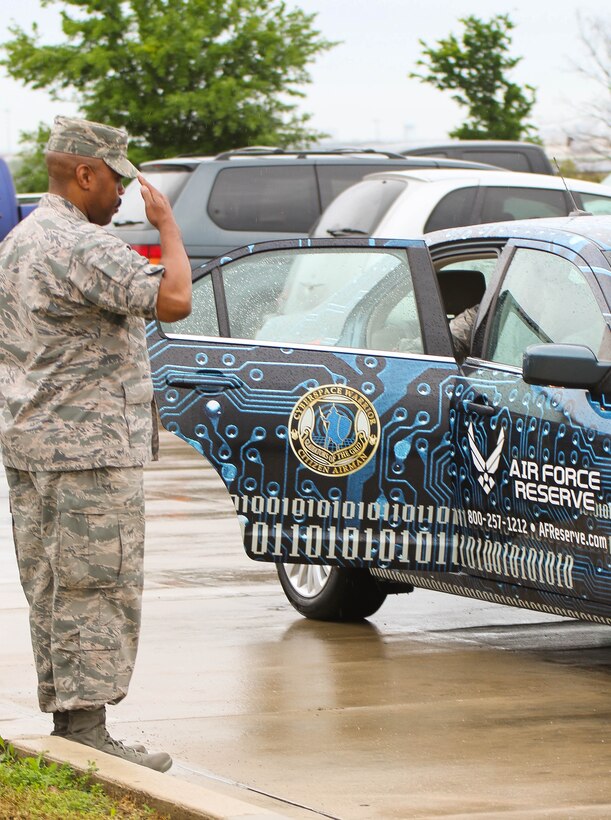Col. Lloyd Terry, 960th Cyberspace Operations Group commander, greets Lieutenant General James F. Jackson, Air Force Reserve Command commander, as he arrives for a visit to the 960 CyOG April 10 at Joint Base San Antonio-Lackland, Texas. The 960 CyOG is the first cyberspace group in the Air Force and has administrative control over 10 Reserve cyber units throughout the country. Its mission is to train and equip Citizen Airmen to extend, operate, defend and engage to fight and win... in, from and through Cyberspace. (U.S. Air Force photo/Master Sgt. Josh Woods)