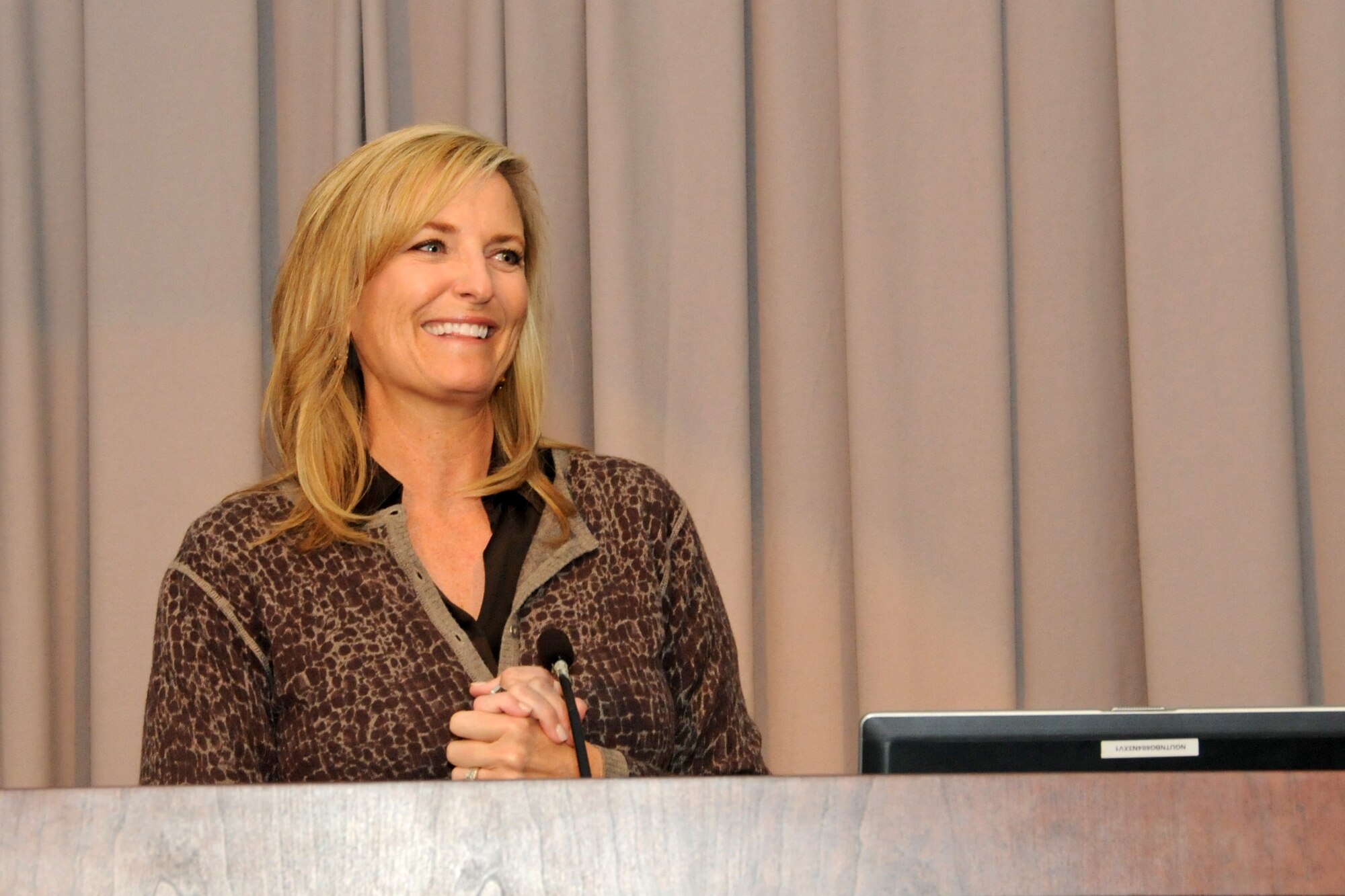 Keynote speaker Sharlene Wells Hawkes, Utah businesswoman and DACOWITS member, addresses attendees during the Sisters-In-Arms program kickoff event April 1, 2015 at Utah National Guard Joint Force Headquarters in Draper. The purpose of the initiative is to mentor, educate, train and empower service members to become future leaders. (Air National Guard photo by Capt. Jennifer Eaton/RELEASED)