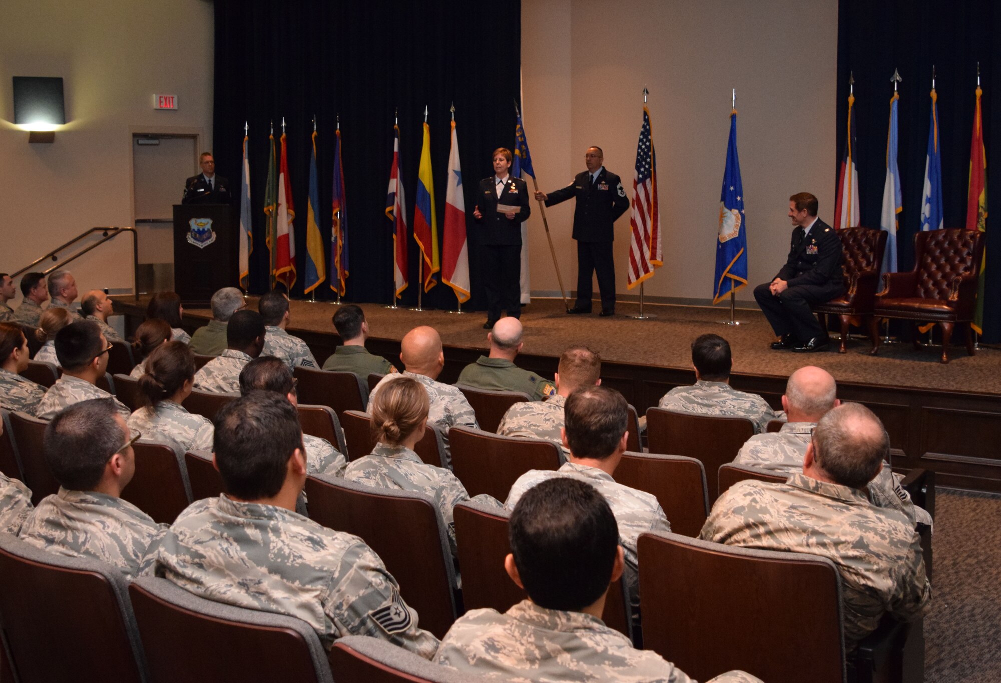 Col. Gretchen M. Wiltse, 433rd Maintenance Group commander, addresses the men and women of her new unit during the 433rd MXG assumption of command ceremony April 12, 2015 at the Inter-American Forces Academy auditorium on Joint Base San Antonio-Lackland. (U.S. Air Force photo/Tech. Sgt. Lindsey Maurice)