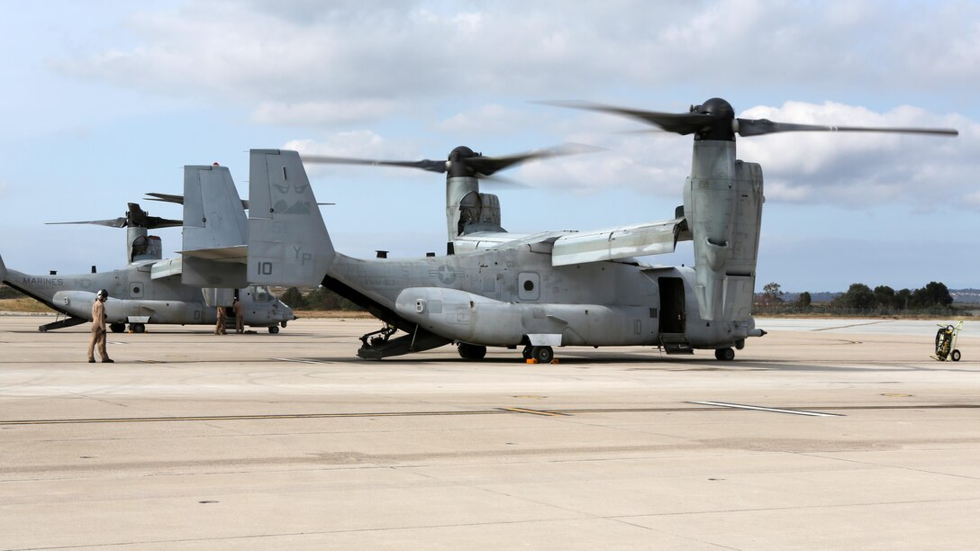 Marines with Marine Medium Tiltrotor Squadron 163 perform pre-flight checks on MV-22B Ospreys prior to a large-scale training flight aboard Marine Corps Air Station Miramar, California, April 10. This training operation marks the last time the commanding officer of VMM-163 will participate in a squadron-sized event before relinquishing command. 