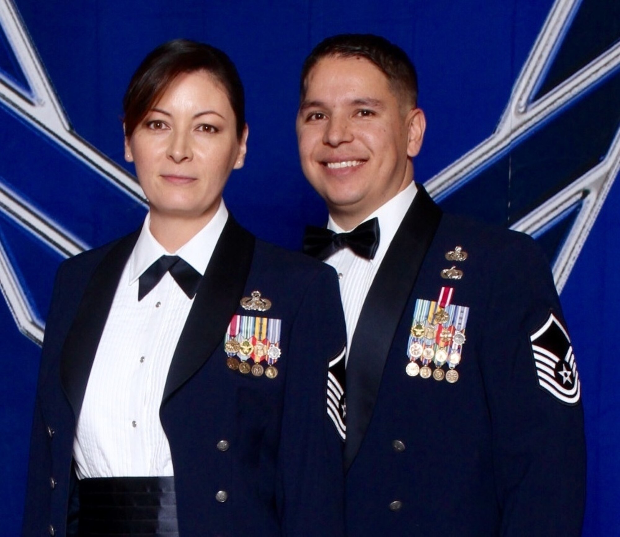 Master Sgts. Angela and Phillip Sisneros pose for a photo at the 2014 Air Force Ball in Las Vegas, Sept. 27, 2014. The couple was married on Aug. 1, 2011, but Phil was in a motorcycle accident 12 days later that would lead to his eventual medical retirement in 2014. (Courtesy photo)
