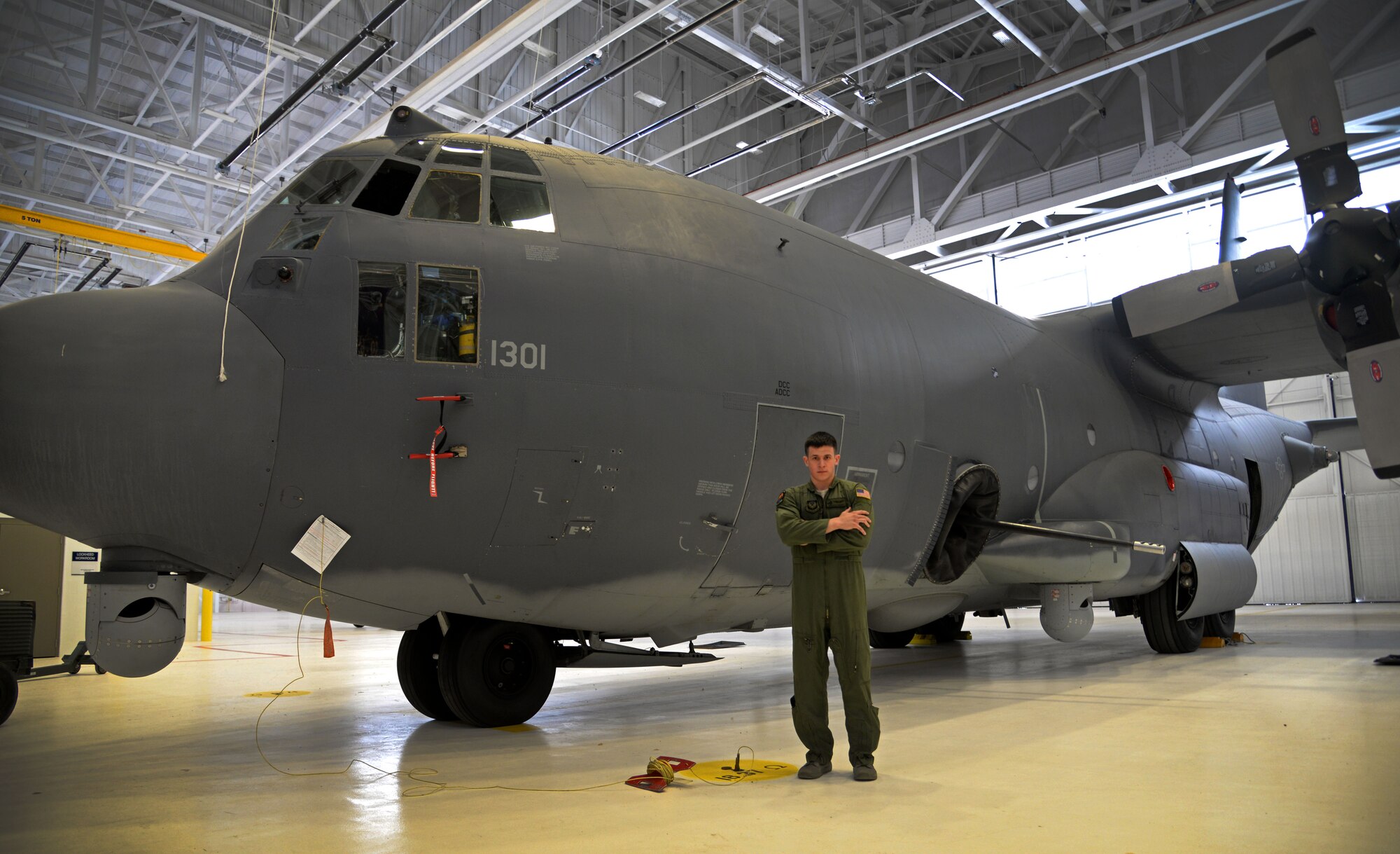 U.S. Air Force Senior Airman Kyle Gaffey, 73rd Special Operations Squadron special missions aviator, stands in front of an AC-130W Stinger II April 10, 2015 at Cannon Air Force Base, N.M. Gaffey helps operate and maintain weapons systems on the AC-130Ws, and acts as a loadmaster for cargo and passengers. (U.S. Air Force photo/Staff Sgt. Alex Mercer) 