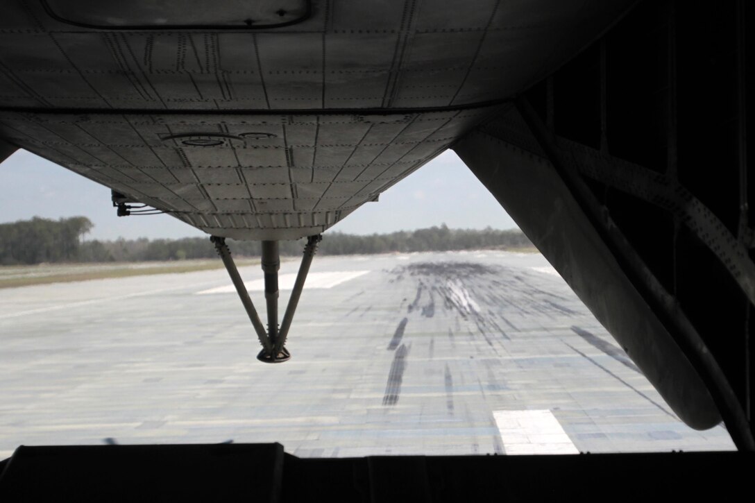 A rear-facing view of the expeditionary air field at Auxiliary Landing Field Bogue shows evidence of countless landings performed here by naval aviators with 2nd Marine Aircraft Wing, April 8, 2015.
Pilots from Marine Corps Air Station Cherry Point, N.C., and across 2nd MAW frequently train at ALF Bogue to prepare for expeditionary operations, sea-based force projection and aviation support of the Marine Air-Ground Task Force.