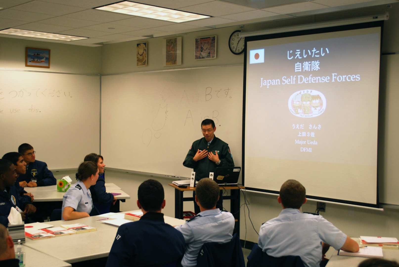 In this file photo, Japan Air Self-Defense Force Maj. Kazuto Ueda teaches military strategy and operations during a Japanese language class at the U.S. Air Force Academy, Colo. Every year, the Academy and Japan's National Defense Academy exchange an officer to teach military and strategic studies for two years. Ueda, the Academy's 17th Japanese exchange officer, arrived in 2013. 