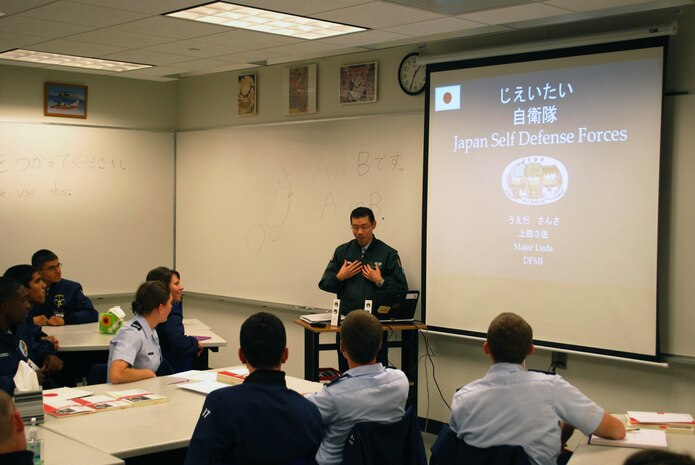 In this file photo, Japan Air Self-Defense Force Maj. Kazuto Ueda teaches military strategy and operations during a Japanese language class at the U.S. Air Force Academy, Colo. Every year, the Academy and Japan's National Defense Academy exchange an officer to teach military and strategic studies for two years. Ueda, the Academy's 17th Japanese exchange officer, arrived in 2013. 