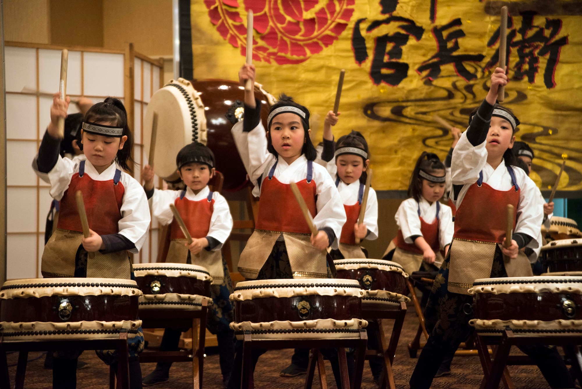 A team of young Japanese drummers perform during the Japan Day opening ceremony at Misawa Air Base, Japan, April 11, 2015. Dozens of performances took place to highlight and recognize Japanese traditions throughout the day. (U.S. Air Force photo by Staff Sgt. Derek VanHorn/Released)