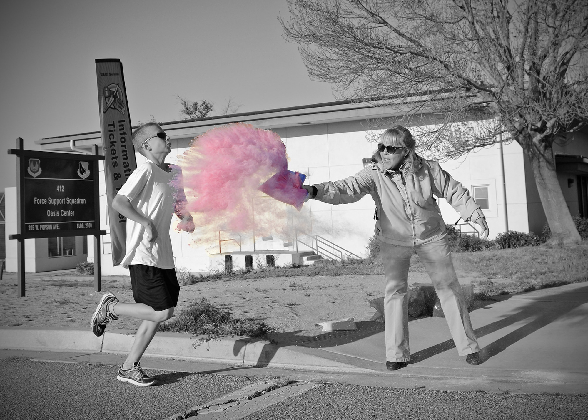 Zack Gilbertson, dependent, passes one of the last color splash checkpoints
during the Color Splash Fun Run held April 8, 2015, around the Rosburg
Fitness Center. Gilbertson finished first in the male runner category and
Jamie Muniz, from the 412th Operations Support Squadron, finished first in
the female runner category. In total, the event had 74 participants who
attended this year's fun run, which was held in observance of Sexual
Assault Awareness Month (SAAM), National Alcohol Awareness Month and Child
Abuse Prevention Month. (U.S. Air Force composite photo by Jet Fabara)
