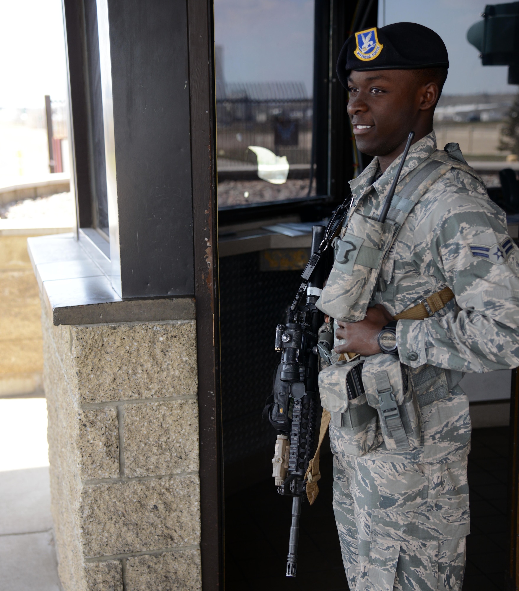 Airman 1st Class Danallen Lee, 341st Security Forces Squadron member, stands guard at a gate April 9, 2015, at Malmstrom Air Force Base, Mont. Lee was recently accepted to the Air Force Academy Preparatory School in Colorado Springs, Colo. (U.S. Air Force photo/ Airman 1st Class Dillon Johnston)