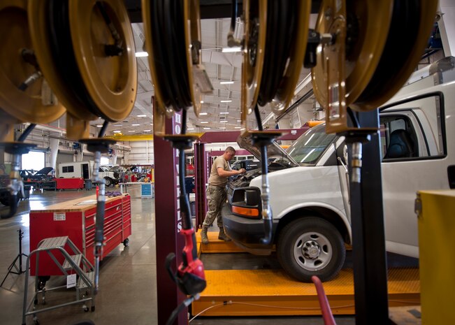 Airman 1st Class Dillon Goulet, 99th Logistics Readiness Squadron Vehicle Management Flight equipment maintainer, checks the functionality of a vehicle at Nellis Air Force Base, Nev., April 7, 2015. The vehicle management flight is comprised of more than 130 Airmen and civilians who are charged with managing more than 1,500 vehicles. (U.S. Air Force photo by Staff Sgt. Siuta B. Ika)