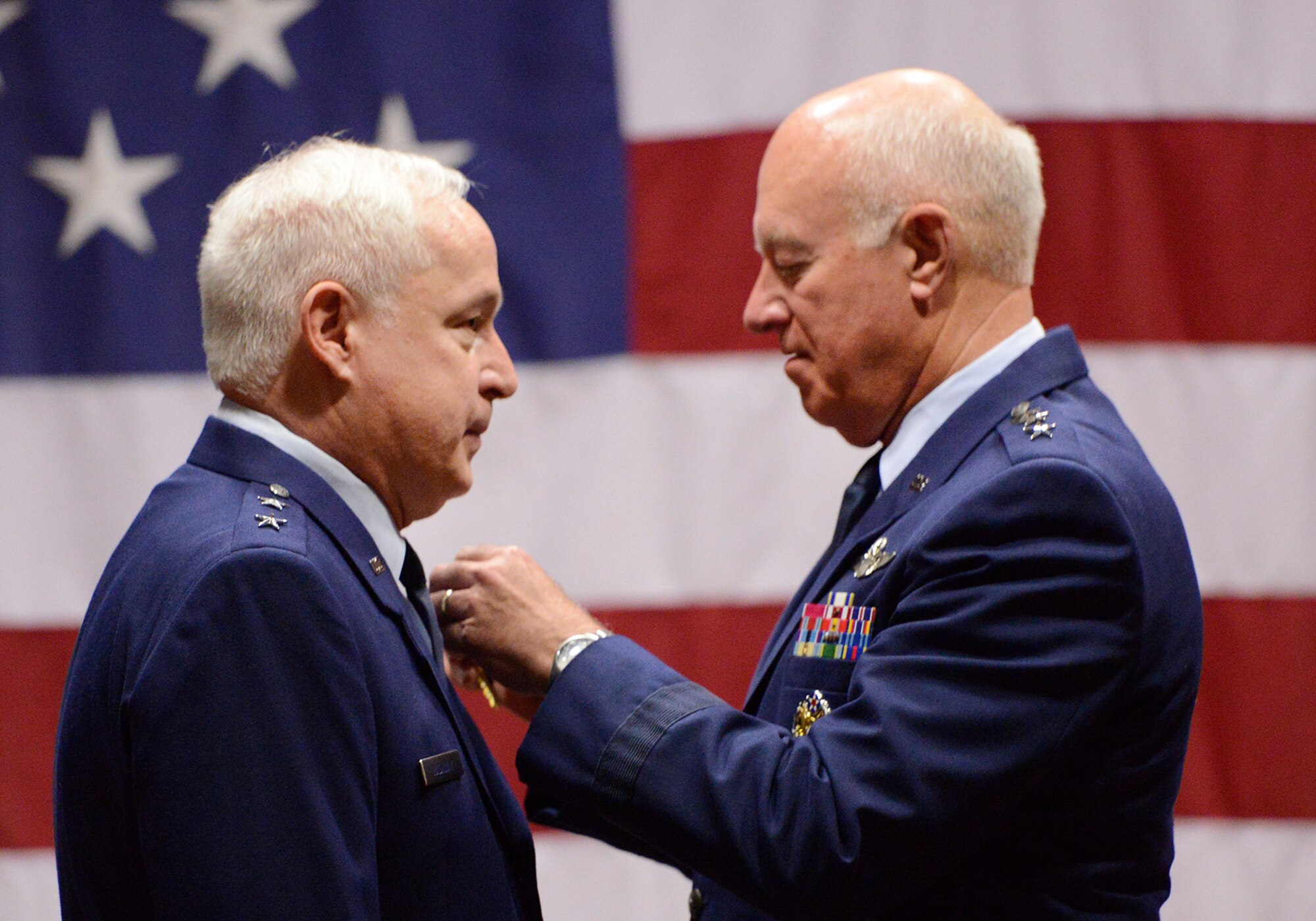 Maj. Gen William S. Hadaway III, former Director of Logistics, National Guard Bureau, receives "The Distinguished Service Medal" from former Director of the Air National Guard Lt. Gen. Harry M. Wyatt III (ret.), April 11, at the Brig. Gen. Joseph W. Turner complex, Tulsa Air National Guard Base, Okla.  Both Wyatt and Hadaway were former wing commanders at the 138th Fighter Wing in Tulsa.  (U.S. National Guard photo by Master Sgt. Mark A. Moore/Released