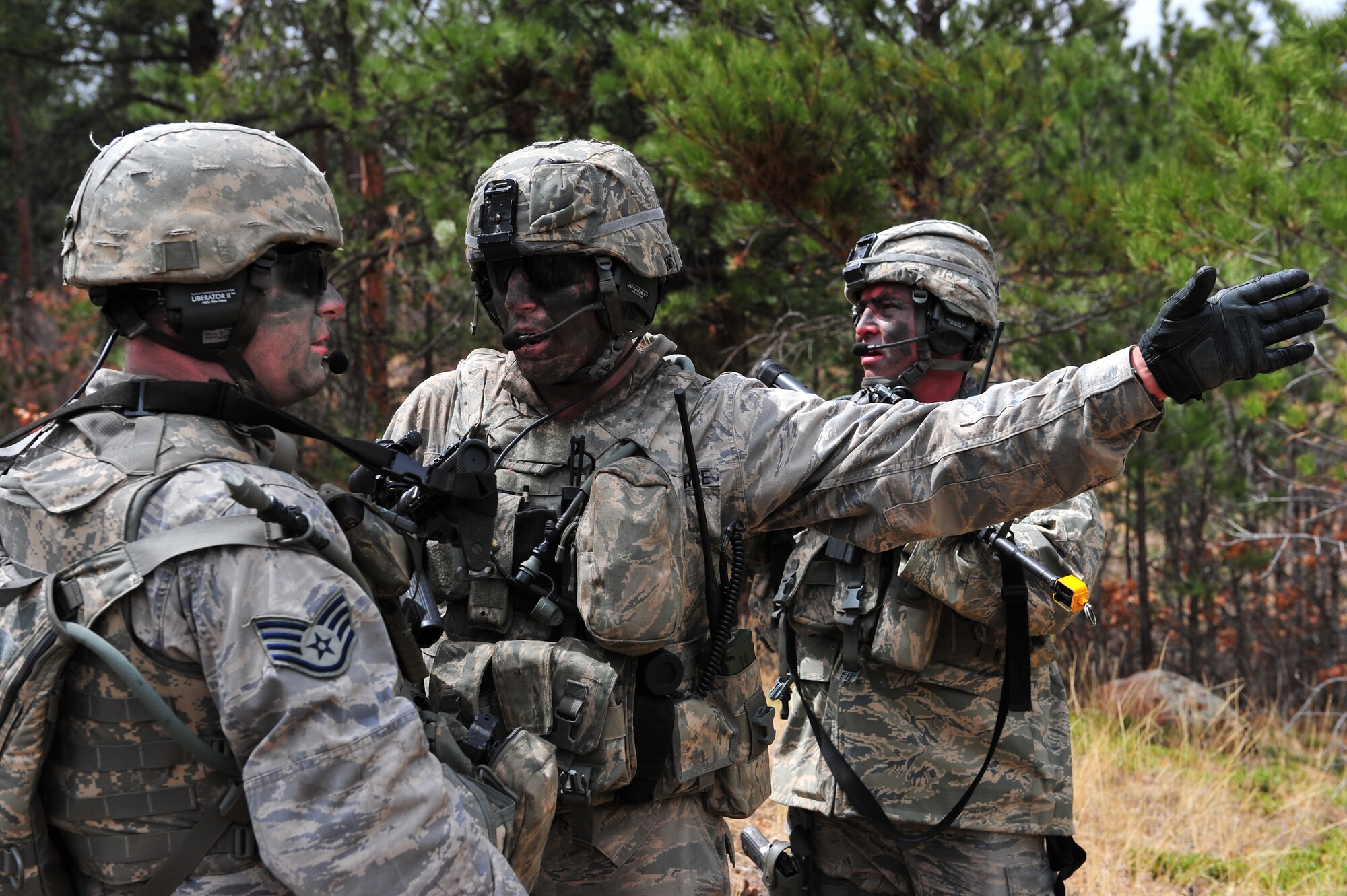Air Force Reservists Staff Sgt. Steven Massey and Senior Airman James Protsman, take a moment to formulate their next plan of attack during a training mission April 9, 2015, at the U.S. Air Force Academy in Colorado Springs, Colo. The 710th and 310th Security Forces Squadrons held a joint combat leaders course while living in field conditions. The 710th SFS is out of Buckley Air Force Base, Colo., and the 310th is out of Schriever AFB.
(U.S. Air Force photo/Tech. Sgt. Nicholas B. Ontiveros)