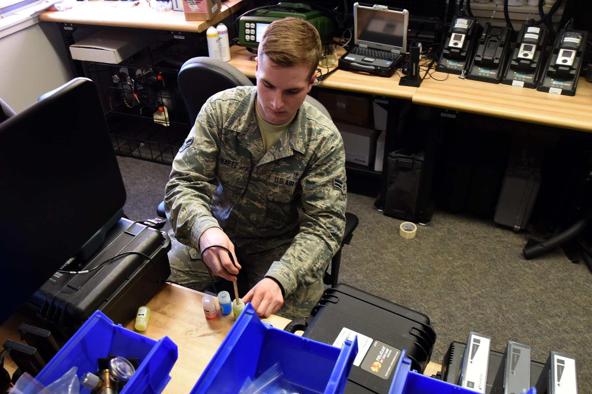 Airman 1st Class William Raetz, 341st Medical Operations Squadron bioenvironmental engineering technician, calibrates a pH meter for routine drinking water sampling April 8, 2015 at Malmstrom Air Force Base, Mont. Bioenvironmental periodically check the base supply water for acidity. (U.S. Air Force photo/Chris Willis)