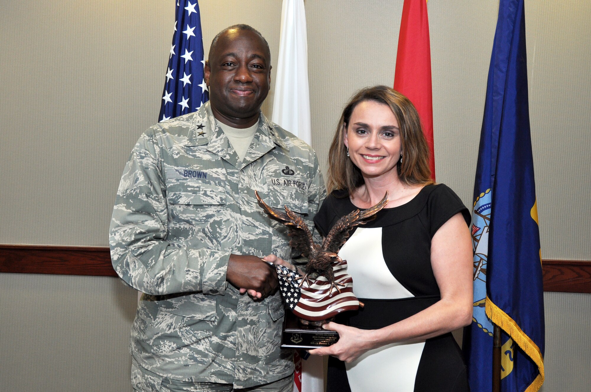 GOODFELLOW AIR FORCE BASE, Texas – Maj. Gen. Mark A. Brown, Second Air Force Commander, presents the 2014 Civilian (Supervisory Category II) of the Year Award for Second Air Force to Donna L. Casey, 17th Training Wing Sexual Assault Response Coordinator, at the Norma Brown Building April 8. Maj. Gen. Brown also presented awards to the 2014 Second Air Force Airman of the Year and 2014 Second Air Force Honor Guard Program Manager of the Year to Goodfellow members. (U.S. Air Force photo/ Senior Airman Joshua Edwards)