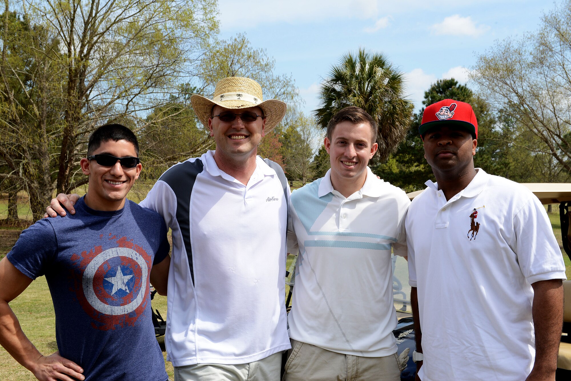 U.S. Air Force Chief Master Sgt. Charles Mills, 20th Fighter Wing command chief, (second from left) and his team prepare for the Spring Classic Kick-off at Carolina Lakes Golf Course at Shaw Air Force Base, S.C., April 3, 2015. Supervisors use the golf course to mentor and build camaraderie with their Airmen. (U.S. Air Force photo by Senior Airman Diana M. Cossaboom/Released)