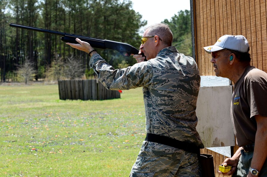 U.S. Air Force Col. John Thomas, 20th Mission Support Group commander, shoots a shotgun at the 20th Force Support Squadron trap and skeet range at Shaw Air Force Base, S.C., April 2, 2015. The range consists of a trap and skeet area, a pistol range, and an archery range open to anyone who is able to get on base. (U.S. Air Force photo by Senior Airman Diana M. Cossaboom/Released)