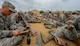 A United States Air Force basic trainee tries the drink packaged in his Meal Ready to Eat, or MRE, at the Basic Expeditionary Airman Skills Training site at Joint Base San Antonio-Lackland, Texas, April 8, 2015. Known as the 