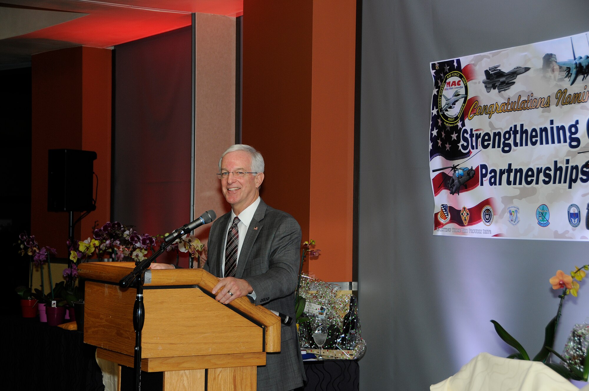 Retired Air Force Gen. Douglas Fraser, keynote speaker for South Dade Chamber of Commerce Military Affairs Committee's 16th Annual Awards Banquet, described the three elements to effective partnerships to the crowd of attendees, which followed the “Strengthening our Partnerships” theme of the banquet which was held in Community Activity Center on April 11. The theme for the MAC event supports the Air Force program working to partner with the local community and federal agencies through Public-Public, Public-Private Partnership. (U.S. Air Force photo/Senior Airman Aja Heiden)