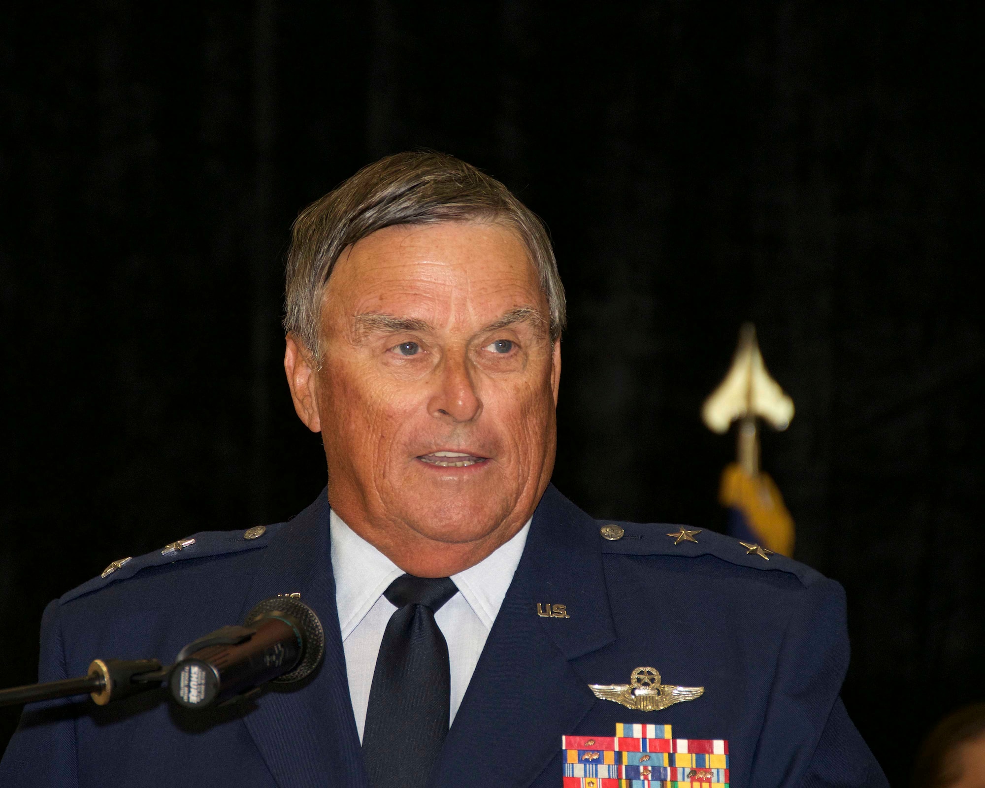 Retired Maj. Gen. Thomas Dyches, who served as the Assistant to the Chairman of the Joint Chiefs of Staff for Reserve Matters, officiated a promotion ceremony where Brig. Gen. Christian G. Funk, 482nd Fighter Wing commander, was officially promoted to the rank of brigadier general at Homestead Air Reserve Base, Fla., April 11. Dyches was instrumental in bringing Funk on board as a reservist when he was a detachment commander at Shaw Air Force Base, N.C., in 1996. (U.S. Air Force photo by Staff Sgt. Jaimi L. Upthegrove)