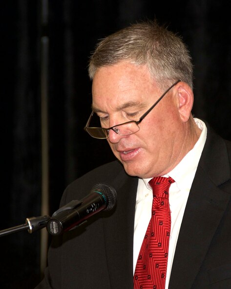Tommie O’Brien, a personal friend of Brig. General Christian G. Funk, delivers the invocation during Funk’s promotion ceremony. During the ceremony, Funk, the 482nd Fighter Wing commander was officially promoted to the rank of brigadier general at Homestead Air Reserve Base, Fla., April 11. (U.S. Air Force photo by Staff Sgt. Jaimi L. Upthegrove)