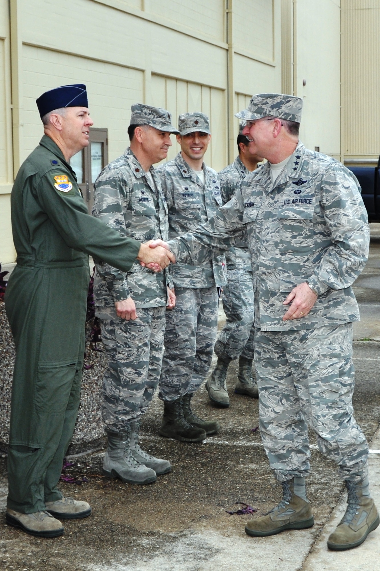 Lt. Gen. James Jackson, the Chief of Air Force Reserve and Commander of Air Force Reserve Command, shakes hands with Lt. Col. J.C. Miller, 68th Airlift Squadron deputy commander, during his visit to the 433rd Airlift Wing, April 11, 2015 at Joint Base San Antonio- Lackland, Texas. (U.S. Air Force photo by Capt. Cris Medina)
