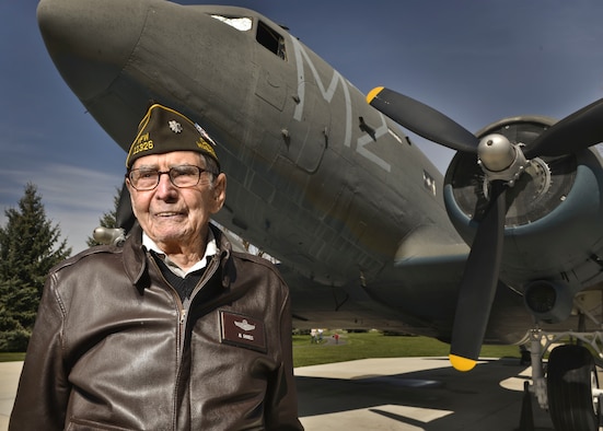 Retired U.S. Air Force Lt. Col. Alston Daniels stands proudly outside of a C-47D Skytrain on static display at Fairchild AFB, Wash. April 7, 2015. Daniels flew the C-47 during World War II and calls it his favorite plane of the 10 he flew throughout his career. (U.S. Air Force photo/Staff Sgt. Alex Montes)