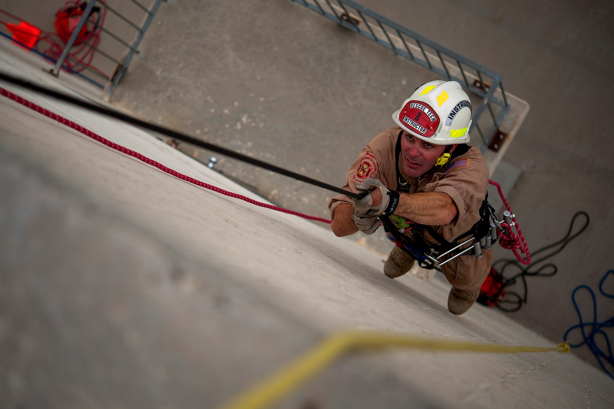 GOODFELLOW AIR FORCE BASE, Texas – Tech. Sgt. Aaron C. Brackett, 312th Training Squadron rescue course NCO in charge, rappels up a wall at the Louis F. Garland Department of Defense Fire Academy April 8. Brackett is the 2014 Air force Fire Service Instructor of the Year. (U.S. Air force photo/ Airman 1st Class Devin Boyer)
