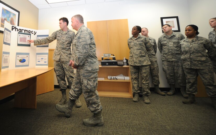 Lt. Gen. Thomas Travis, United States Air Force Surgeon General, visits the 79th Medical Wing Pharmacy during a site visit at Joint Base Andrews, Md., April 7, 2015. In this capacity, Travis advises the Secretary of the Air Force, Air Force Chief of Staff and Assistant Secretary of Defense for Health Affairs on aspects pertaining to the health of Air Force members. (U.S. Air Force photo/Airman 1st Class Ryan J. Sonnier)