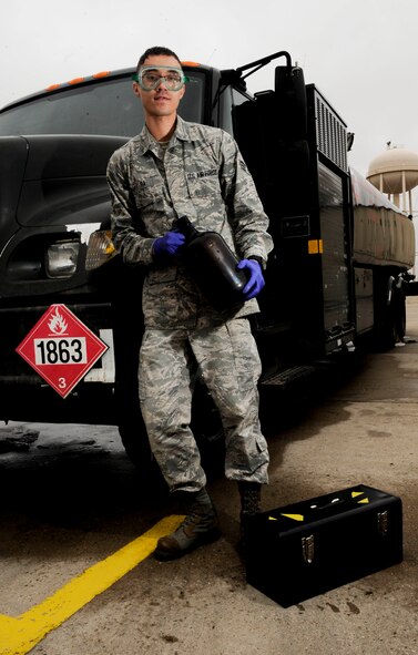Senior Airman Haroon Ra, 5th Logistics Readiness Squadron fuels laboratory technician, poses for a photograph on Minot Air Force Base, N.D., April 8, 2015. The fuels shop supports fuel needs for both aircraft and vehicles used to support the missions of the 5th Bomb Wing and 91st Missile Wing.  (U.S. Air Force photo/Senior Airman Stephanie Morris)