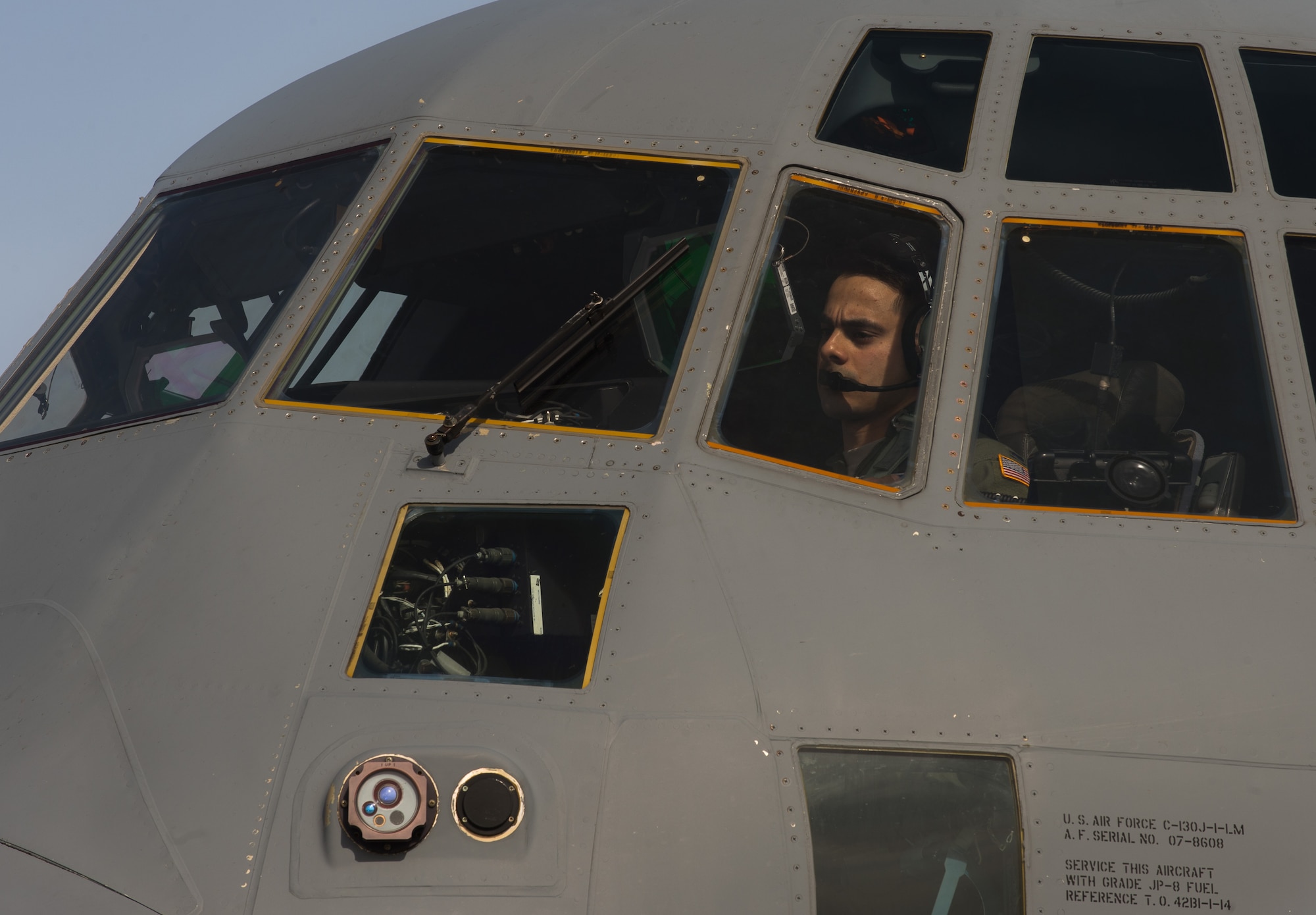 First Lt. Kenneth Hertzler, 37th Airlift Squadron pilot, prepares a C-130J Super Hercules for takeoff at Powidz Air Base, Poland, April 9, 2015. Pilots from the 37th Airlift Squadron trained alongside their Polish counterparts in nighttime low level, unimproved landing zone, dropping Polish air force paratroopers and more. (U.S. Air Force photo/Senior Airman Jonathan Stefanko)