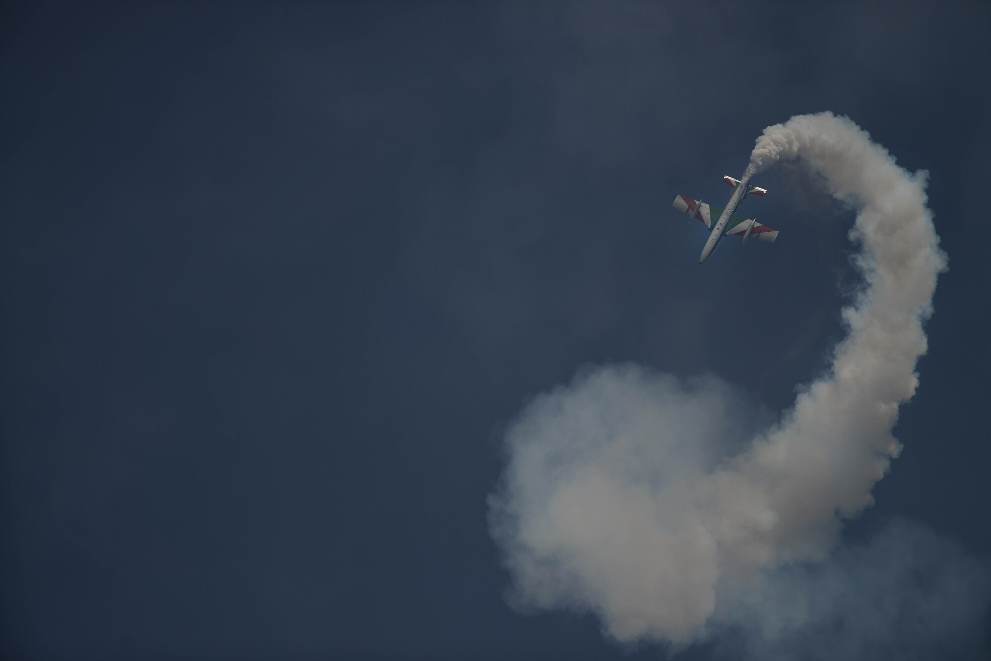 The Frecce Tricolori Italian air force aerobatics team, practices flying formations, April 10,2015, at Aviano Air Base, Italy. Each year, they use the air space above Aviano to practice flying routines for their upcoming air show. (U.S. Air Force photo by Staff Sgt. Evelyn Chavez/Released)