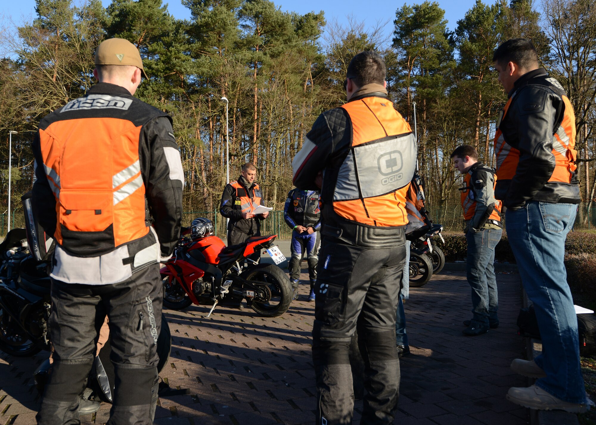 Lt. Col. Paul Silas, 86th Civil Engineer Squadron commander, gives a safety briefing to 86th CEG Airmen before taking off for the 86th CEG Motorcycle Safety Day, April 7, 2015, at the Vogelweh Military Complex, Germany. The purpose of the safety day was to refresh the skills of new riders and allow them to experience the local terrain in a controlled environment before the start of the motorcycle riding season. (U.S. Air Force photo/Airman 1st Class Tryphena Mayhugh)