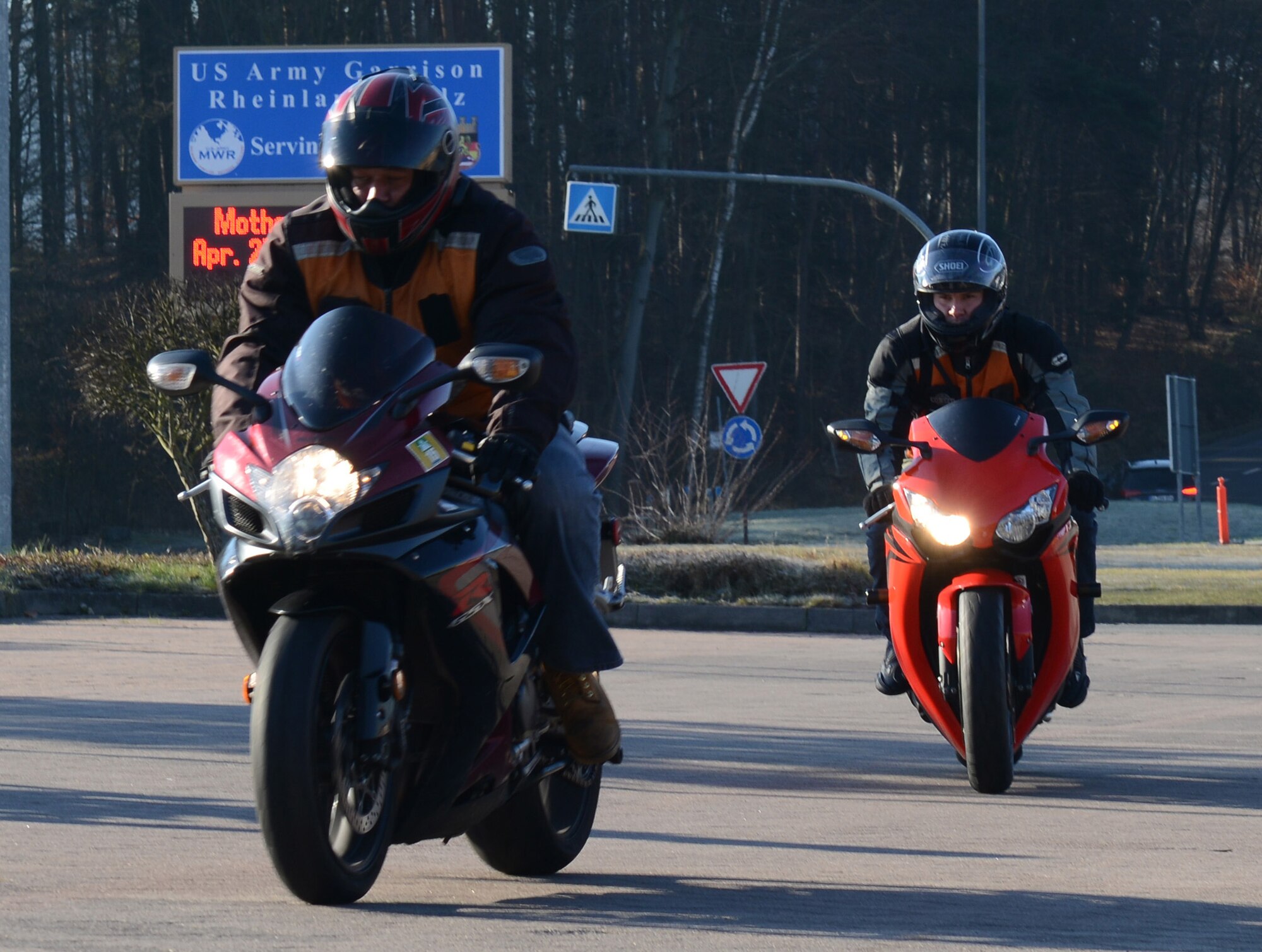 Airmen from the 86th Civil Engineer Group get in place to begin the 86th CEG Motorcycle Safety Day, April 7, 2015, at the Vogelweh Military Complex, Germany. The purpose of the safety day was to give new riders an opportunity to learn from riding coaches, while becoming familiar with the local terrain in a controlled situation before the start of the motorcycle riding season. (U.S. Air Force photo/Airman 1st Class Tryphena Mayhugh)