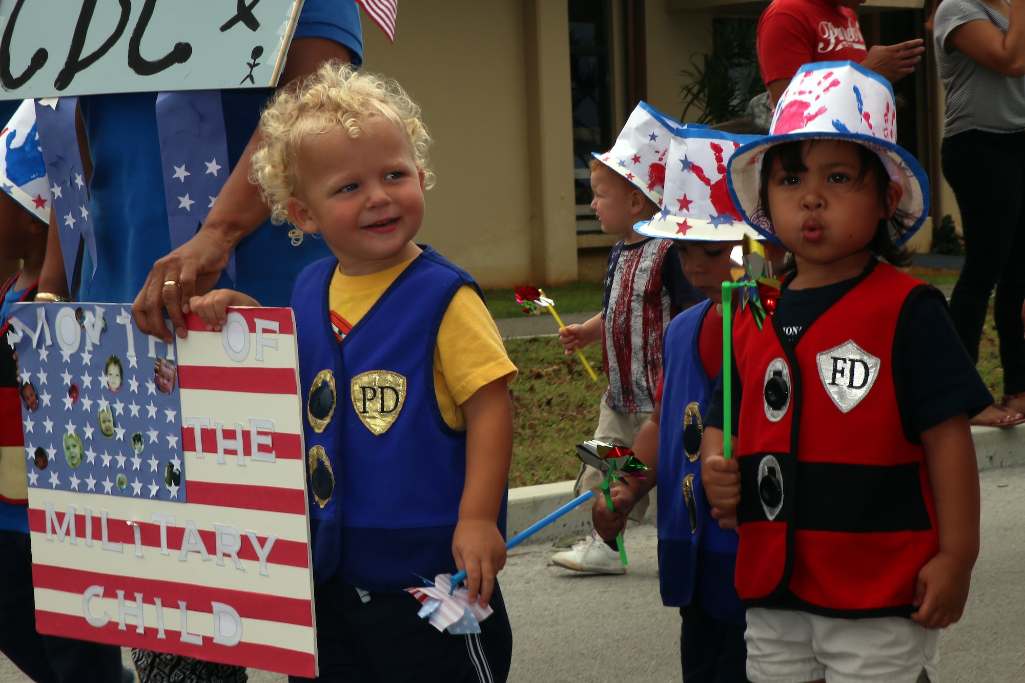 Andersen Child Development Center children participate in a parade April 10, 2015, at Andersen Air Force Base, Guam, to celebrate the Month of the Military Child. April was designated as the Month of the Military Child in 1986 to recognize sacrifices and contributions of children in the armed forces community. (U.S. Air Force photo by Staff Sgt. Melissa B. White/Released)

