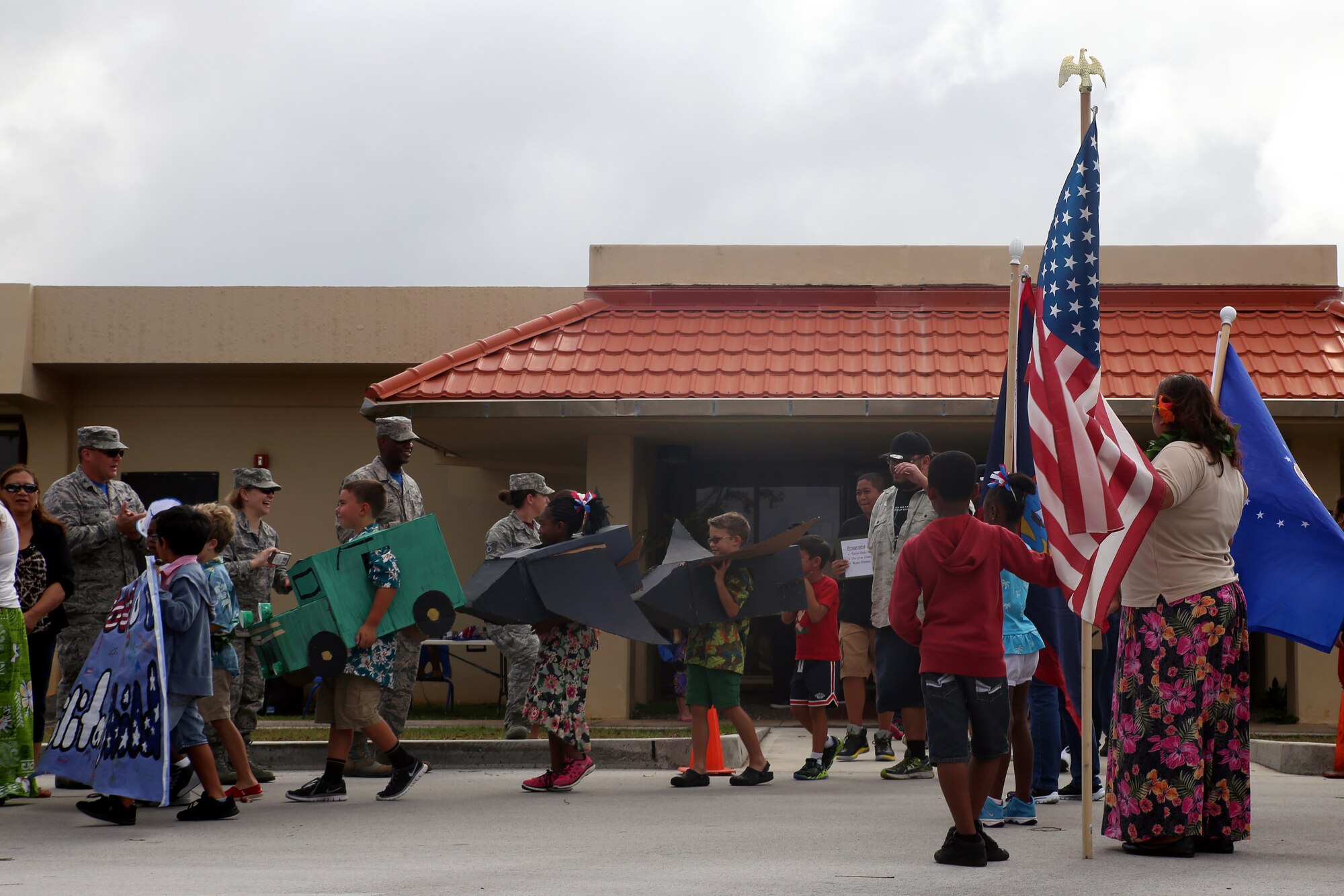 Andersen Child Development Center children participate in a parade April 10, 2015, at Andersen Air Force Base, Guam, to celebrate the Month of the Military Child. April was designated as the Month of the Military Child in 1986 to recognize sacrifices and contributions of children in the armed forces community. (U.S. Air Force photo by Staff Sgt. Melissa B. White/Released)
