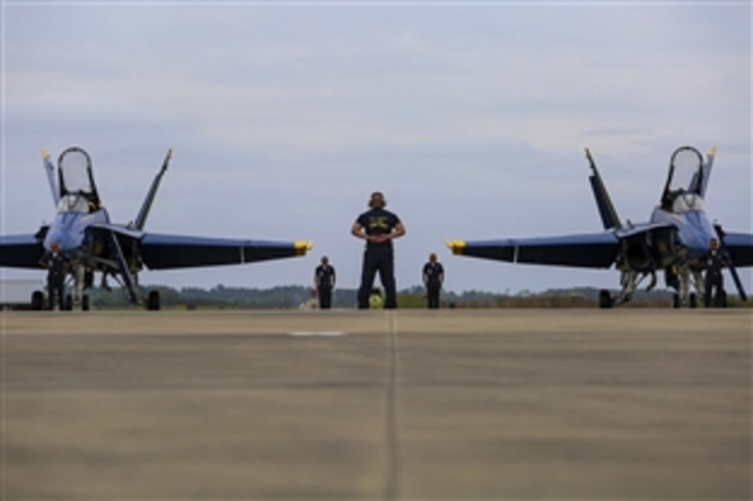 Members of the Navy Flight Demonstration Squadron, the Blue Angels, prepare for a performance during the 2015 Air Show on Marine Corps Air Station Beaufort, S.C., April 12, 2015. 