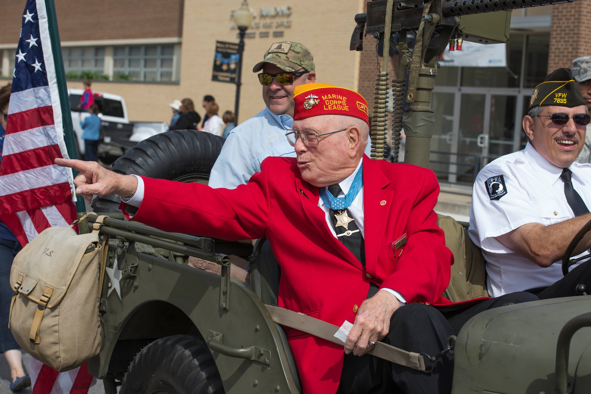 Hershel “Woody” Williams greets people from Gainesville, Texas, during the Medal of Honor Parade, April 11, 2015. Gainesville was said to be the most patriotic city in America in 2012, according to a KXII news article. Gainesville is also the Medal of Honor host city that was established in 2001. (U.S. Air Force photo by Senior Airman Kyle Gese/Released)

