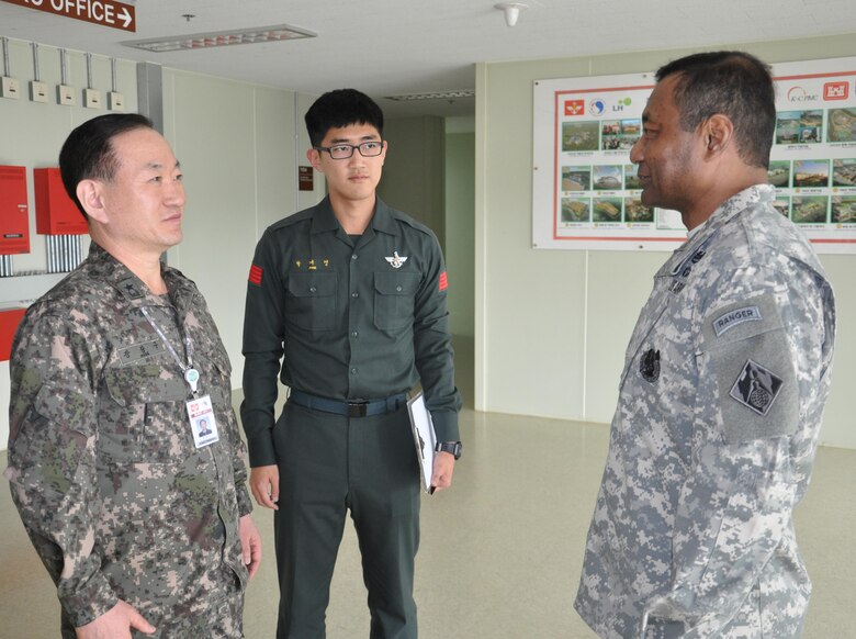 Lt. Gen. Thomas P. Bostick, commanding general of the U.S. Army Corps of Engineers (USACE) and 53rd Chief of Engineers, meets Brig. Gen. Kang, Chang-koo, Director General of Program Management, Ministry of Defense United States Forces Korea Relocation Office at the program management office outside U.S. Army Garrison Humphreys April 8, 2015.
