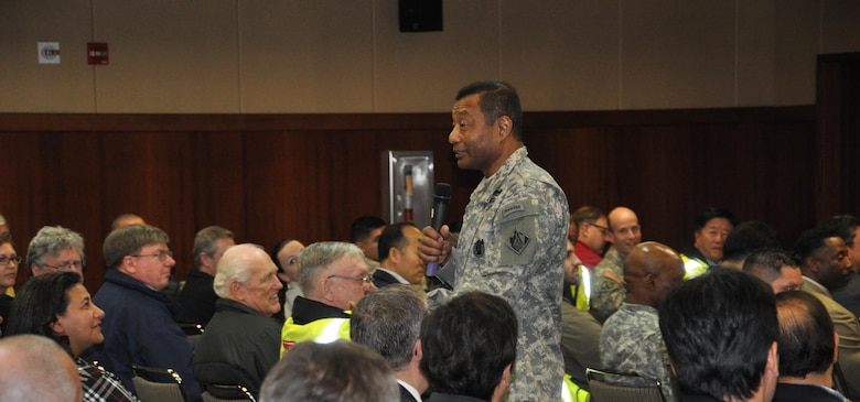 Lt. Gen. Thomas P. Bostick, commanding general of the U.S. Army Corps of Engineers (USACE) and 53rd Chief of Engineers, talks with district employees during a town hall at the super gym on U.S. Army Garrison Humphreys April 8, 2015.