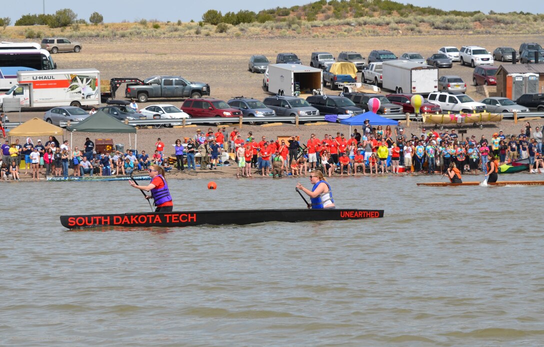 COCHITI LAKE, N.M. -- The South Dakota School of Mining and Technology team races their concrete canoe, April 11, 2015. The South Dakota school placed second at the conference.
