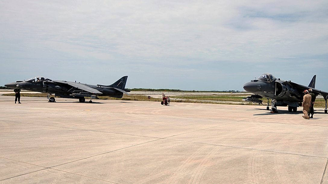 Two AV-8B Harriers assigned to the Bulldogs of Marine Attack Squadron (VMA) 223 start up at Boca Chica Field, Key West, Florida March 25. Naval Air Station Key West is a state-of-the-art facility for air-to-air combat fighter aircraft of all military services and provides world-class pierside support to U.S. and foreign naval vessels. (U.S. Navy photo by Mass Communication Specialist 1st Class Brian Morales/ Released)