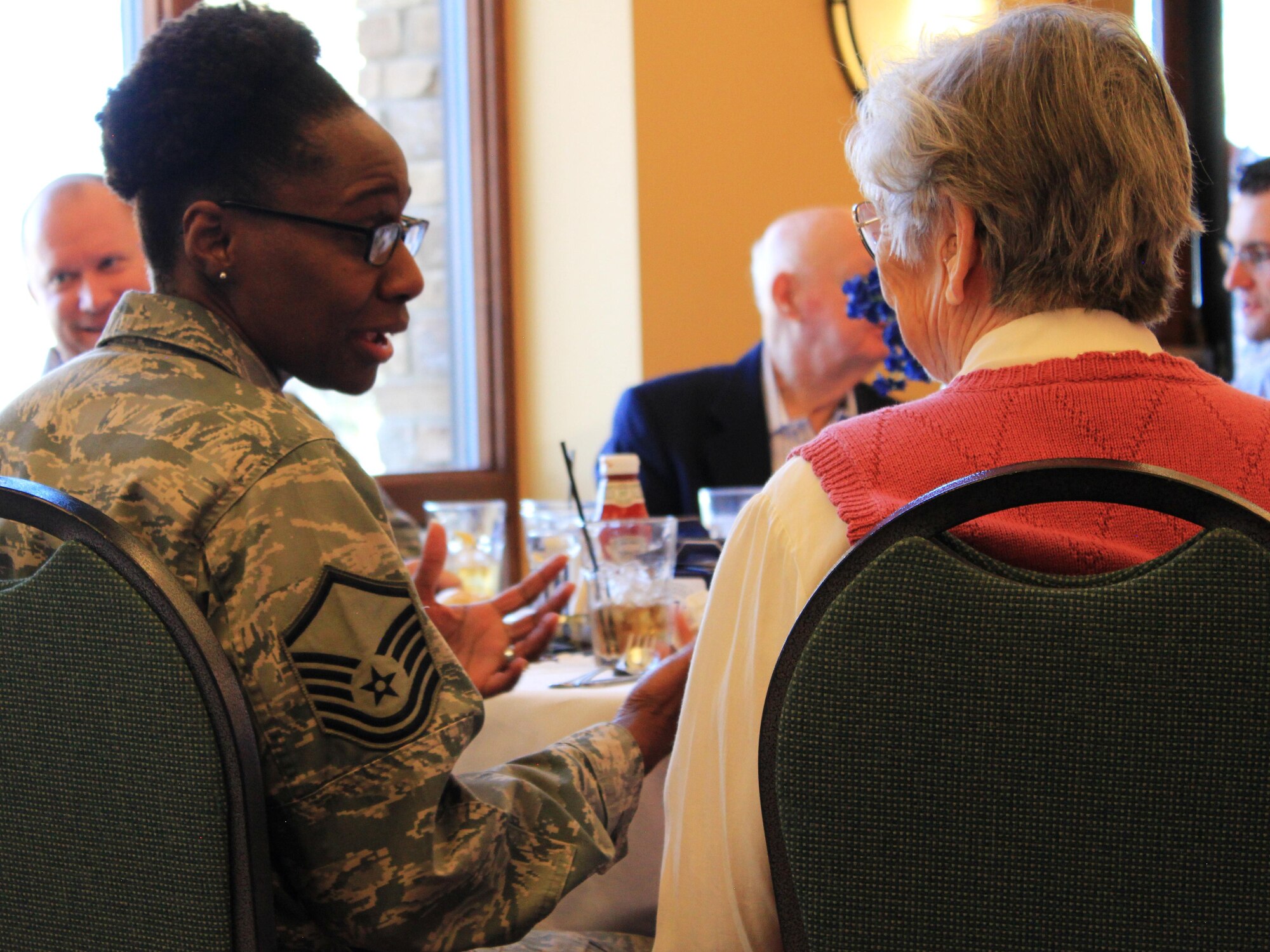 During the HQ RIO Wingman Day lunch, Master Sgt. Melinda Wilkins, HQ RIO readiness office, talked with Ms. Patricia Hamburg, an Air Force nurse in the 1950s, about the differences between being a female Airman then and now. 