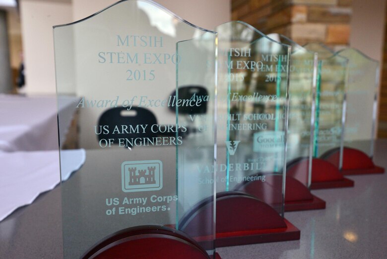 During an awards ceremony at the conclusion of the evaluation, Jimmy Waddle, chief of Engineering and Construction from the U.S. Army Corps of Engineers recognized Dylan Upchurch and Ester Soper, a two-student team from the Central Magnet High school in Murfreesboro.  He presented the team this glass trophy for thier Alternative Cooling System STEM project.  A group of technical experts from the U.S. Army Corps of Engineers Nashville District attended a Science, Technology, Engineering and Mathematics Science Expo as judges and staffed an exhibit sponsored by the Middle Tennessee STEM Innovation Hub at the Middle Tennessee State University in Murfreesboro on April 9. 