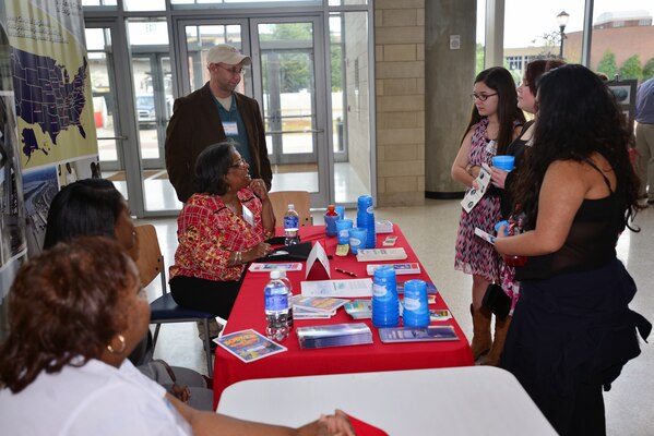 (Left to right) U.S. Army Corps of Engineers employees, David Claussen, an Equal Employment Office specialist, Carol Haynes, chief of Equal Employment Office, Stephanie Coleman, an Equal Employment Office specialist, and Andreas Patterson, chief of Natural Resources talk with Emma Wilbert, Sarah Chichester, and Jesse Mendiola, all 7th graders at Rucker- Stewart Middle School from Gallatin, Tenn during a Science, Technology, Engineering and Mathematics Science Expo sponsored by the Middle Tennessee STEM Innovation Hub at the Middle Tennessee State University in Murfreesboro on April 9.   The Nashville District team set up an exhibit and shared their knowledge about engineering, water management, dam safety, regulatory protection of natural resources, and the role of park rangers who carry out the natural resources mission at Corps projects.