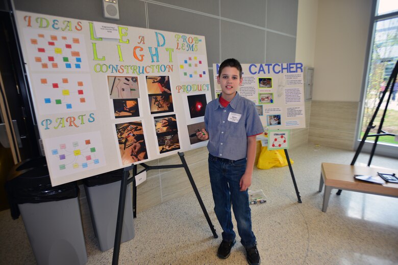 10-year old Dylan Schuch, a student from Union Elementary School in Sumner county gives a presentation of his Lead Light Pencil STEM project to experts from the U.S. Army Corps of Engineers Nashville District during a Science, Technology, Engineering and Mathematics Science Expo sponsored by the Middle Tennessee STEM Innovation Hub at the Middle Tennessee State University in Murfreesboro on April 9, 2015.  