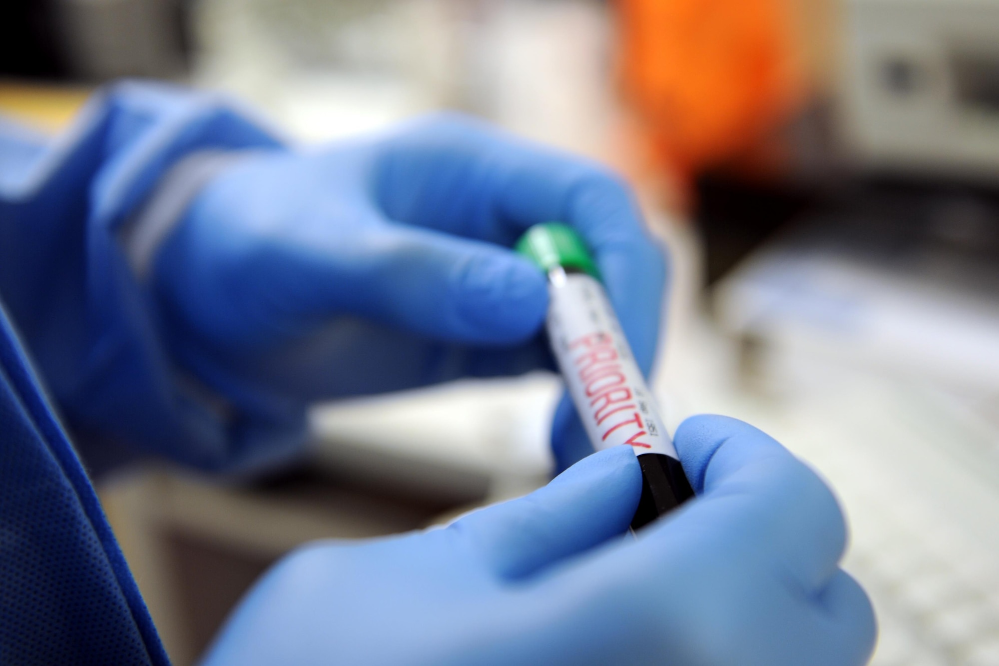 Senior Airman Roger Smith, 1st Special Operations Medical Support Squadron laboratory technician, inspects a specimen label on Hurlburt Field, Fla., April 8, 2015. The 1st SOMDSS Laboratory is comprised of seven personnel who are responsible for more than 17,000 beneficiaries and 156,000 tests a year. (U.S. Air Force photo/Staff Sgt. Katherine Holt)