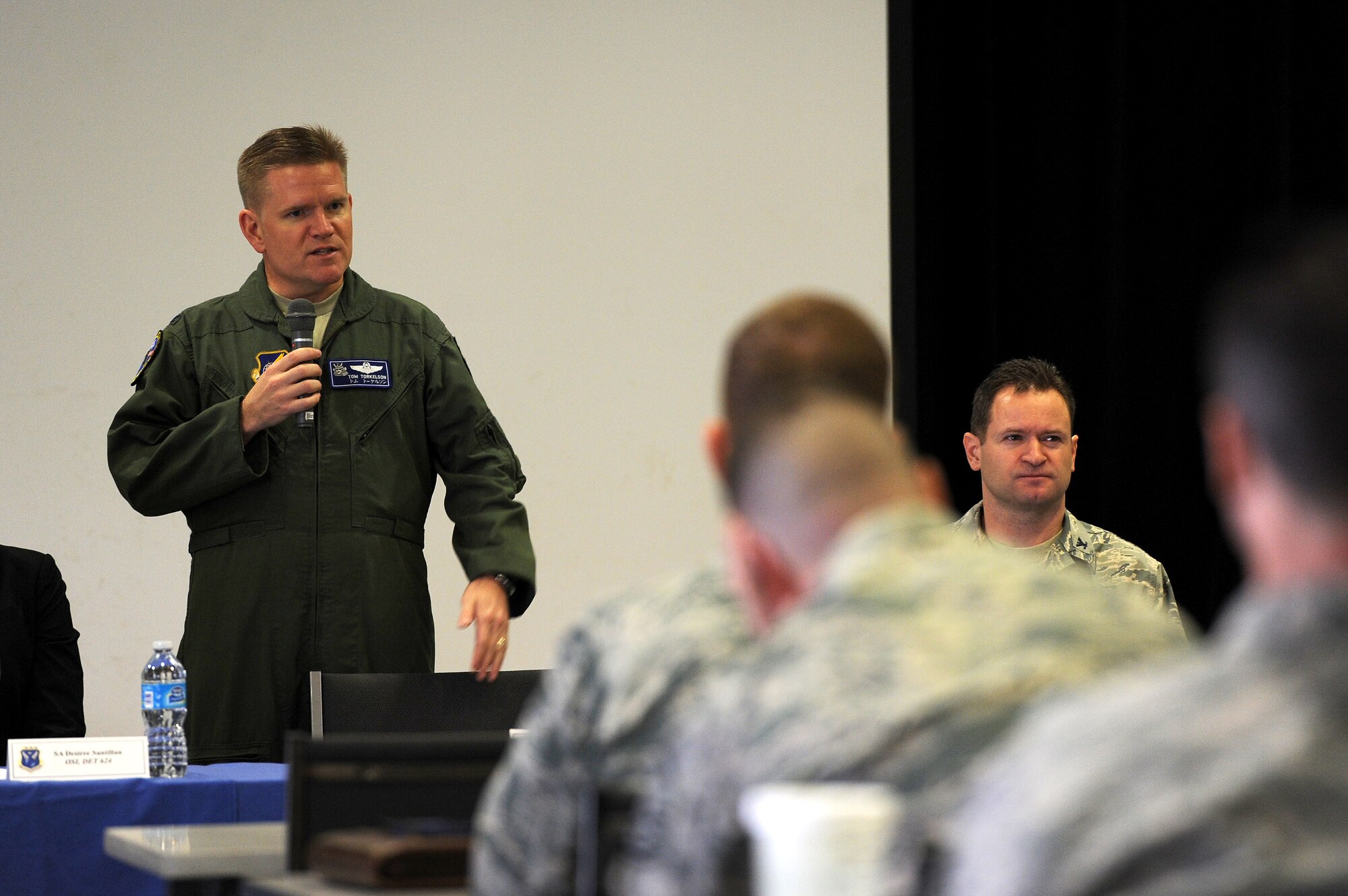 U.S. Air Force Col. Thomas Torkelson, 18th Wing vice commander, gives the opening remarks at a sexual assault prevention and response leadership panel on Kadena Air Base, Japan, April 14, 2015. The panel, the first of its kind at Kadena, was open to all commanders, first sergeants, superintendents and other leaders. It designed to mimic a town hall meeting where leaders could ask questions, address concerns and participate in a discussion about the SAPR investigation process. (U.S. Air Force photo by Airman 1st Class Zade C. Vadnais)