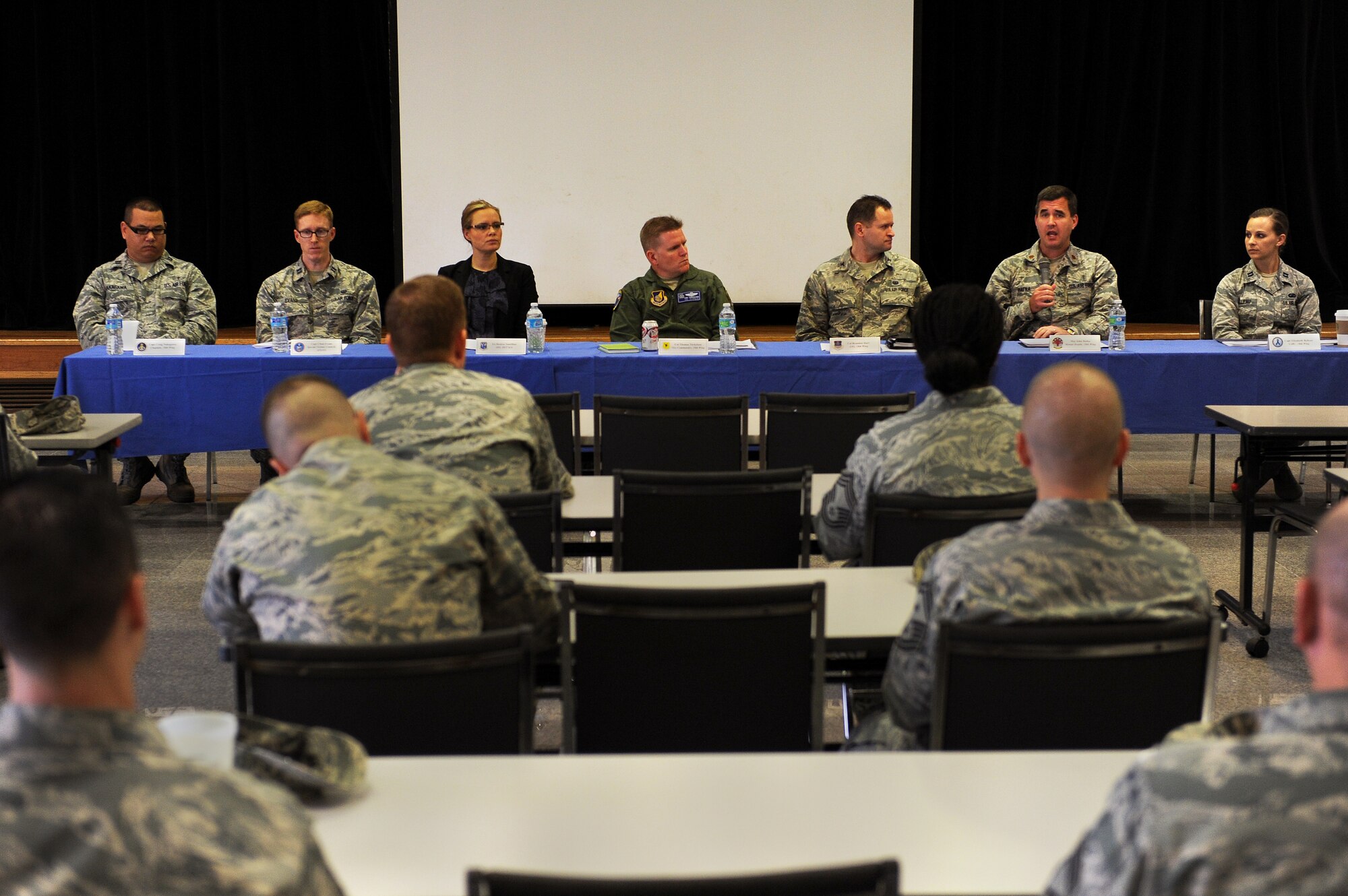 Representatives from all agencies involved in a sexual assault prevention and response investigation form Kadena’s first SAPR leadership panel to answer questions and facilitate conversation about the SAPR investigation process on Kadena Air Base, Japan, April 14, 2015. Leaders from various units around base were invited to discuss the many components of the SAPR investigation process with the hope that they would gain a broader understanding of the process as a whole. (U.S. Air Force photo by Airman 1st Class Zade C. Vadnais)