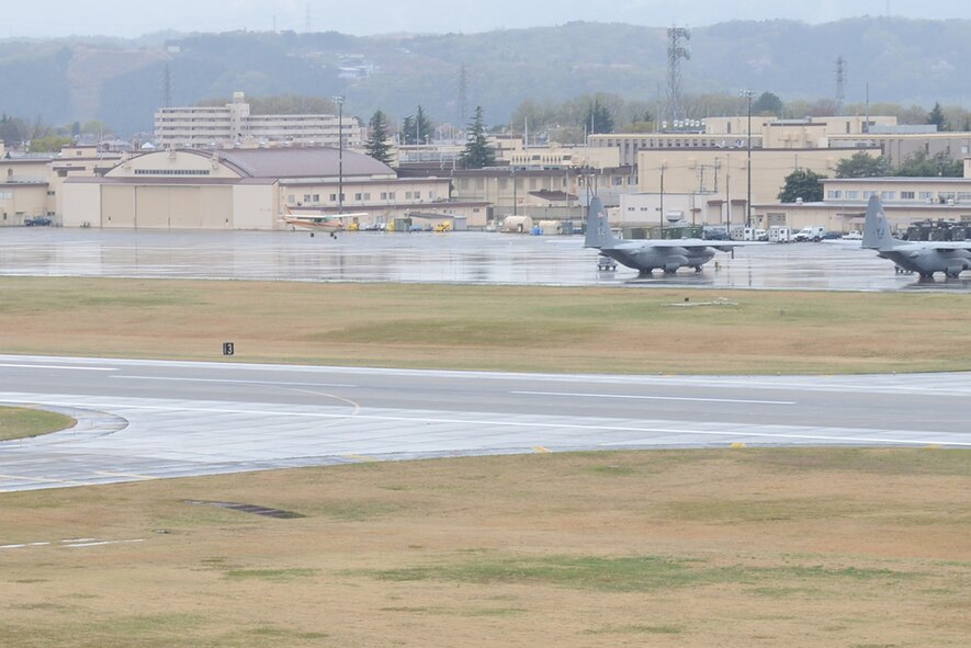 A member of the Aircraft Owners and Pilots Association-Japan lands their Cessna at Yokota Air Base, Japan, April 11, 2015, as part of the Mid-Air Collision Avoidance conference. The MACA conference brought together military and civilian pilots from all over Japan to focus on flight safety and base flight procedures. (U.S. Air Force photo by Airman 1st Class David C. Danford/Released)